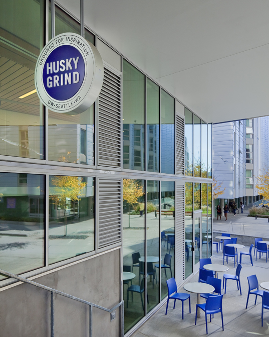 View of Mercer Court courtyard showing coffee shop sign and seating