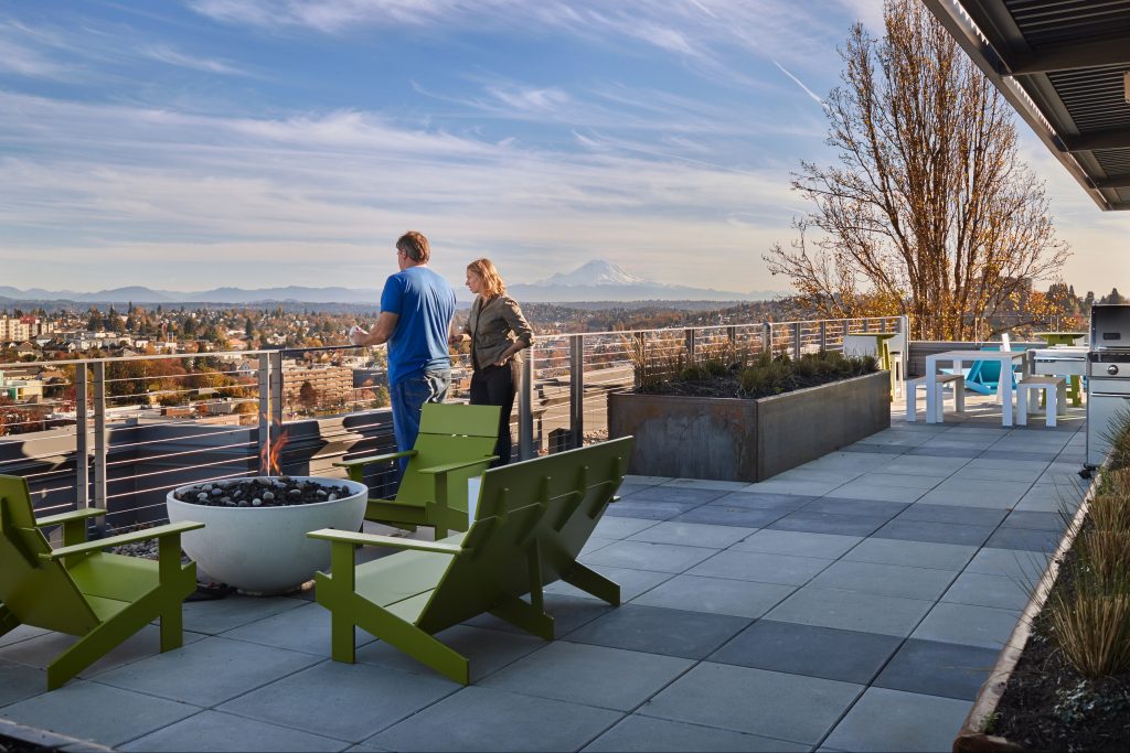 Reverb rooftop showing two people looking at the view