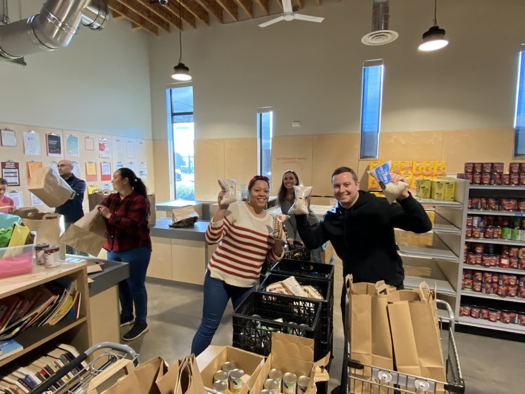 Spectrum employees volunteering at Ballard Food Bank